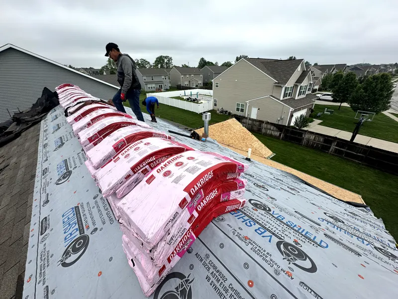 Shingle bundles staged on underlayment during a Bargersville area roof replacement