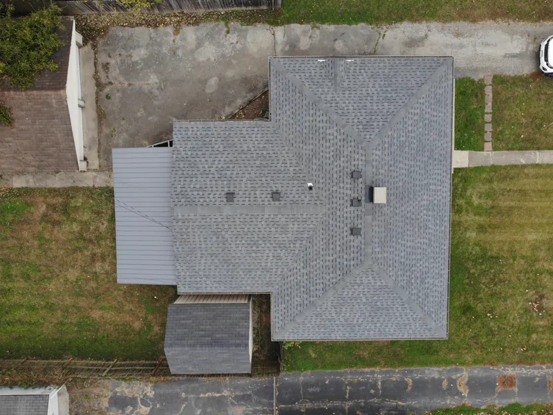 Top-down drone photograph of a gray shingle roof taken during an inspection